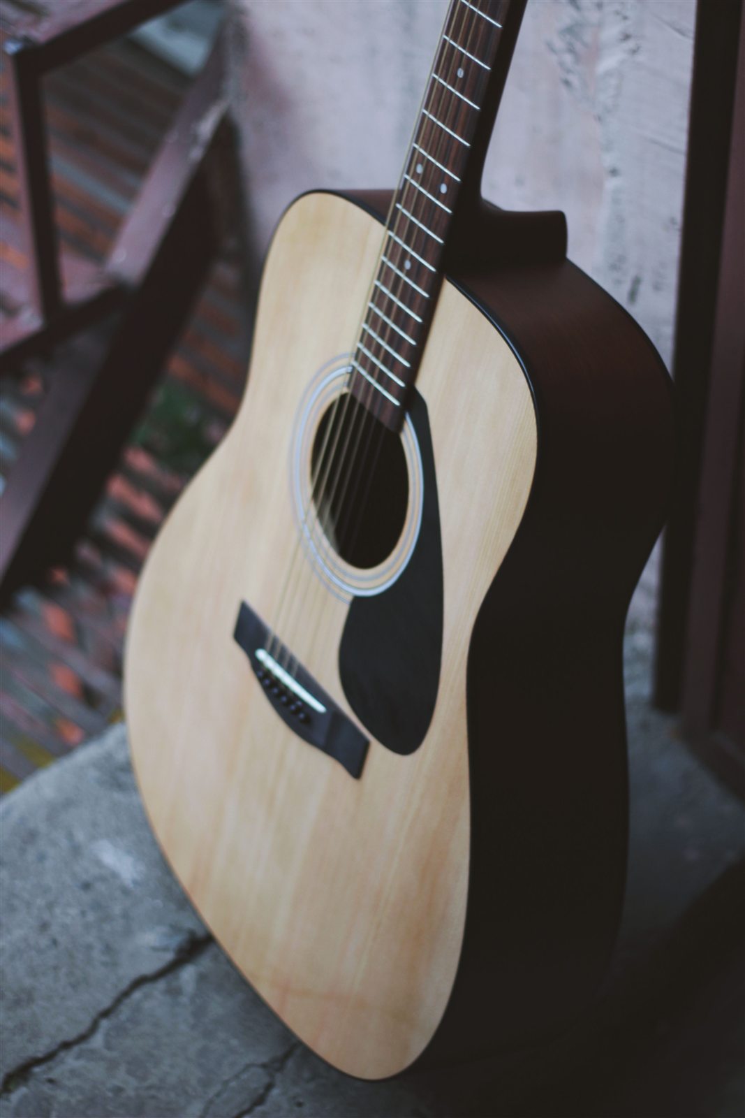 Acoustic guitar ready for a music lesson