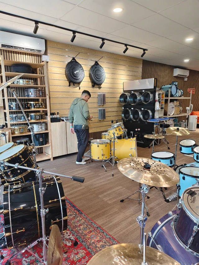 Acoustic drums and cymbals inside Soma Music in Ampang